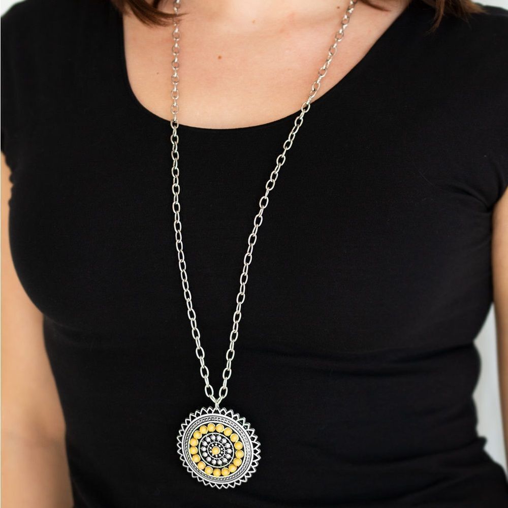 long silver tone chain with boho yellow accent beaded pendant